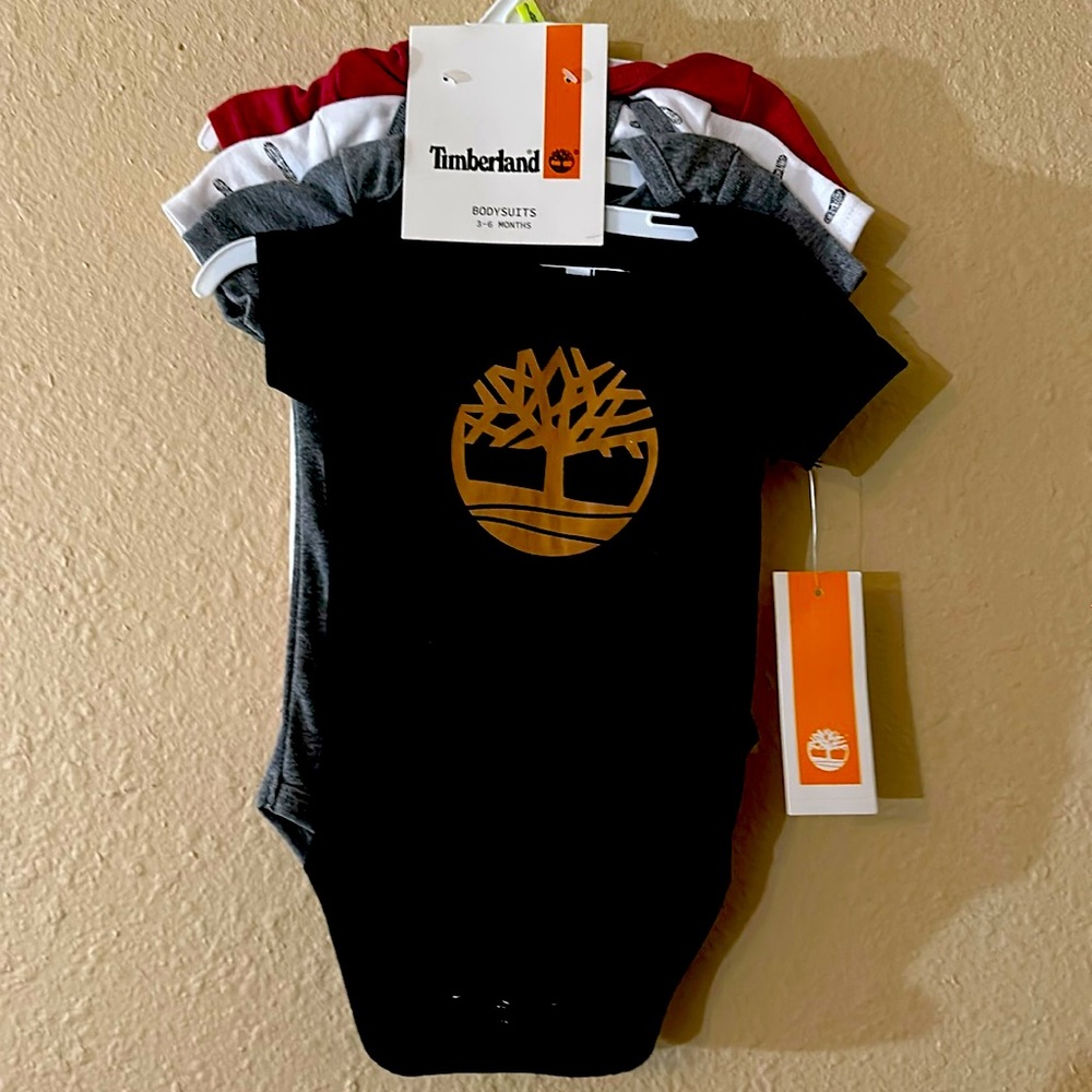 Timberland bodysuits 3 to 6 months set of four new with tags